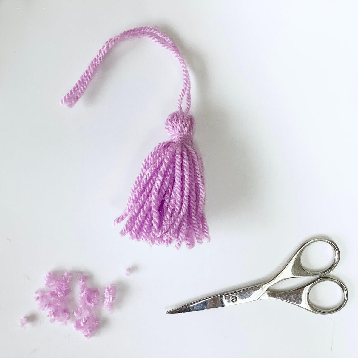 Step 11 of making a tassel