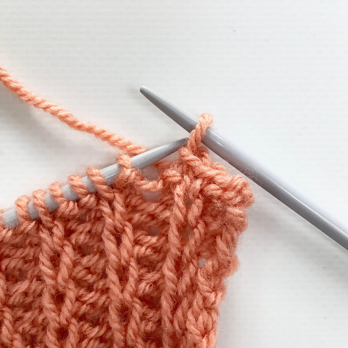 Step 5 of working the buttonhole loop bind-off