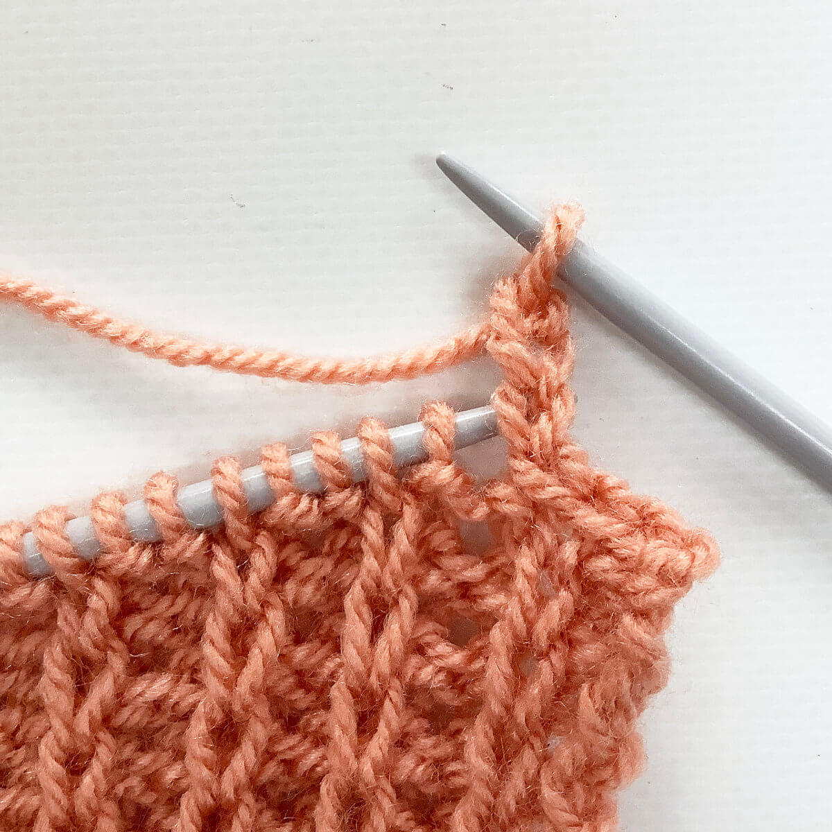 Step 10 of working the buttonhole loop bind-off